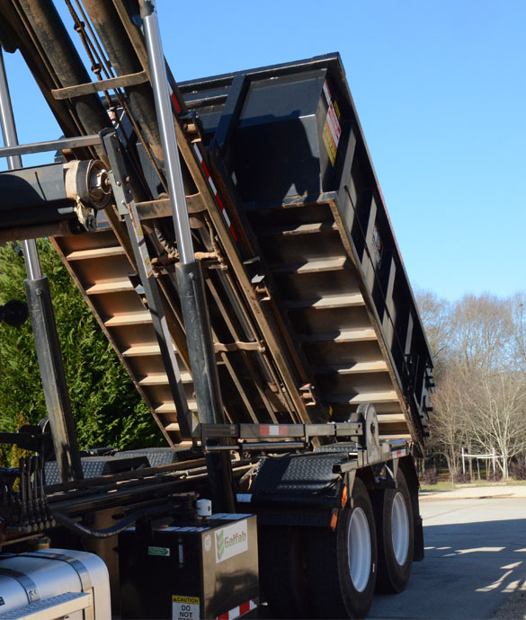 Roll-off waste container